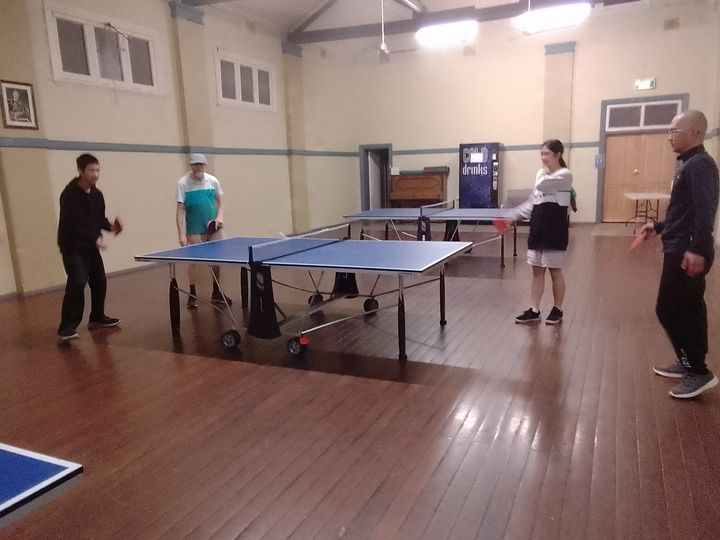 Players enjoying a game of table tennis